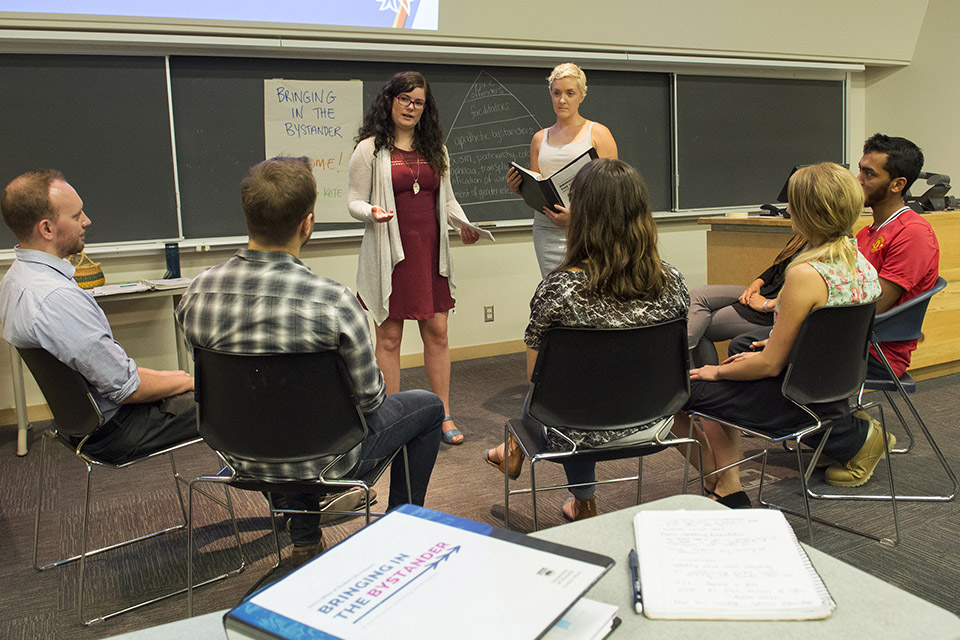 L-R: Pringle and Lord lead a bystander intervention workshop